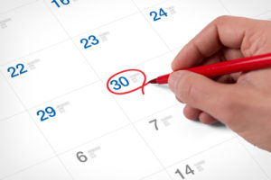 man encircled the 30th day in calendar