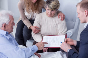 attorney discussing estate planning to the family