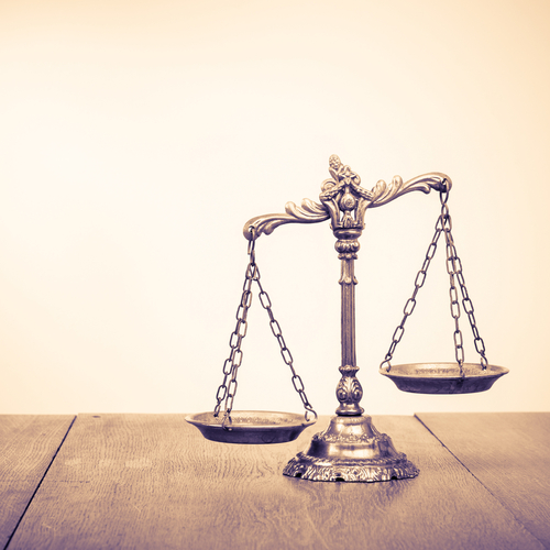 legal malpractice - balance scale
